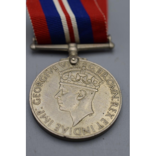 151 - WW2 British war medal. Full size with ribbon