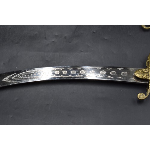 201 - British style Curved Cutlass Sword, brass hilt with a horse head pommel. Brass Scabbard 85cm Long Ov... 