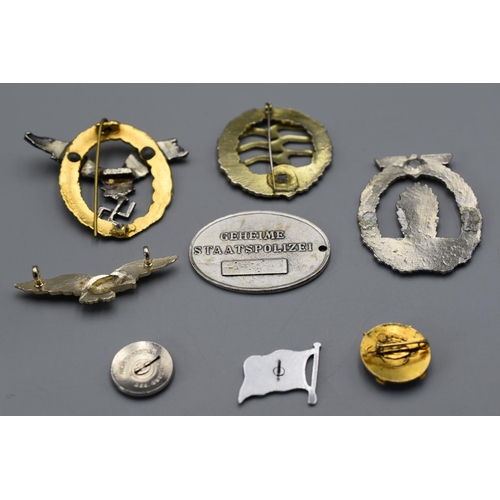 205 - Selection of 8 WWII Era German Replica Badges