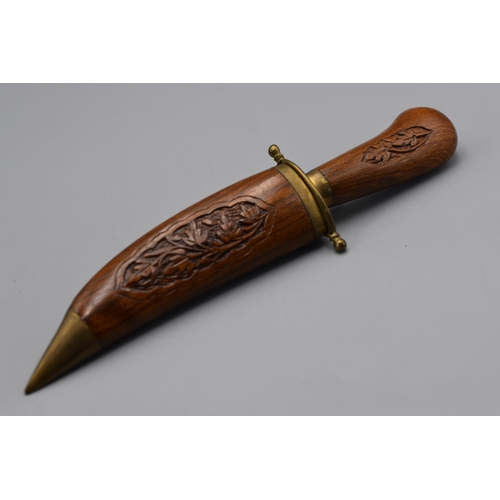 211 - Dagger knife with hand Carved wooden sheath brass locking mechanism