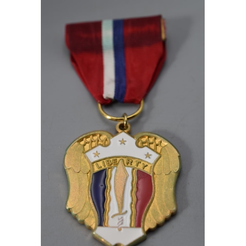 224 - The Philippine Liberation Medal complete with Ribbon