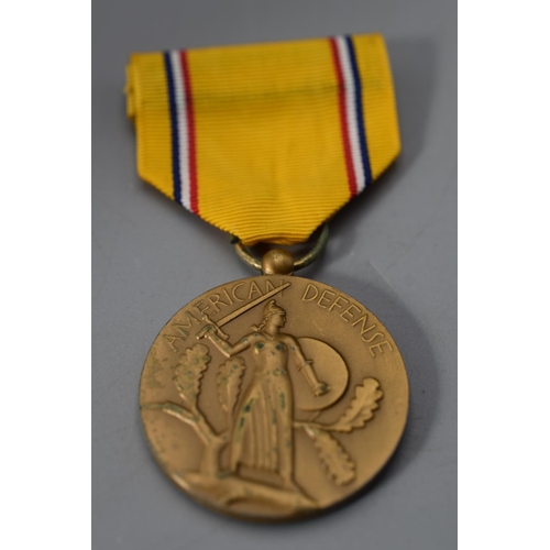 230 - The American Defence Service Medal complete with Ribbon