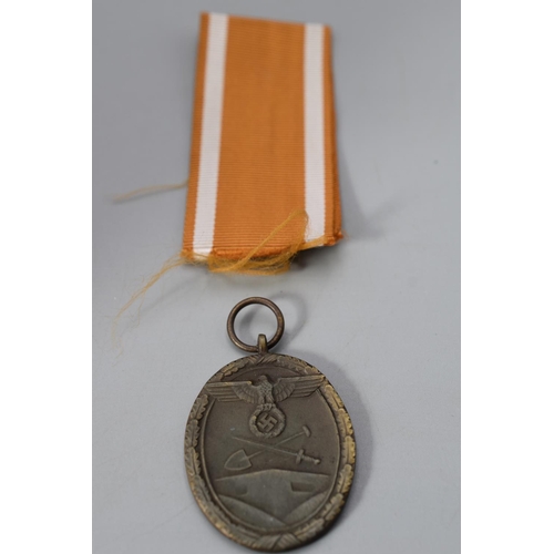 237 - German 1939 WWII Westwall Medal complete with Ribbon