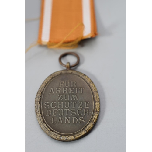 237 - German 1939 WWII Westwall Medal complete with Ribbon