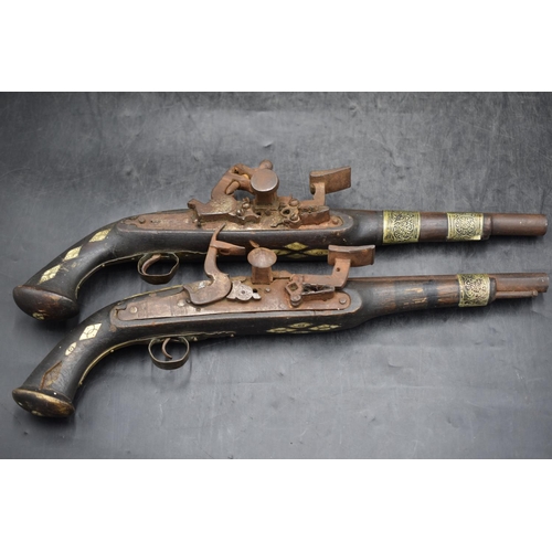 172 - Pair of antique Indo Persian snaphance pistols with ivory inlaid decoration