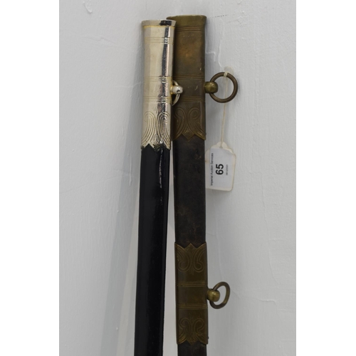 65 - Two leather and brass British Royal Navy officers sword. 85cm long