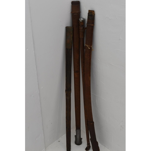 66 - Four different vintage leather sword scabbards