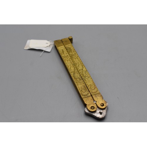 79 - Brass handled folding knife. 23cm long when open