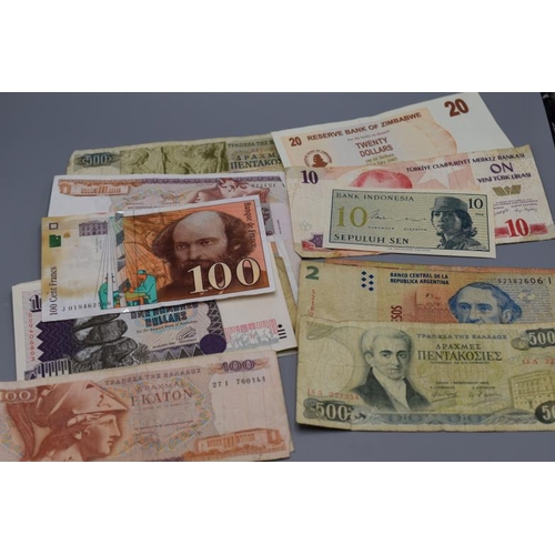 66 - Selection of 23 Worldwide Used Bank Notes including Bank of Zimbabwe, Bank of Uganda, Bank of Indone... 