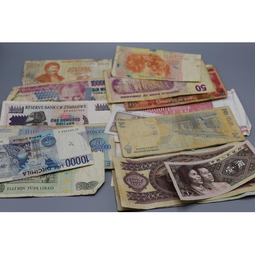 67 - Selection of 24 Worldwide Used Bank Notes including Bank of Uganda, Bank of Italy, Bank of Zimbabwe ... 