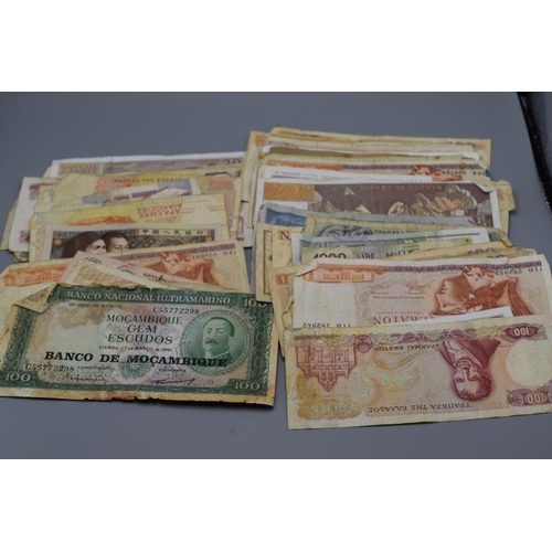 71 - Selection of 60 Worldwide Used Bank Notes including  The Qatar Monetary Agency, Bank of France, Bank... 