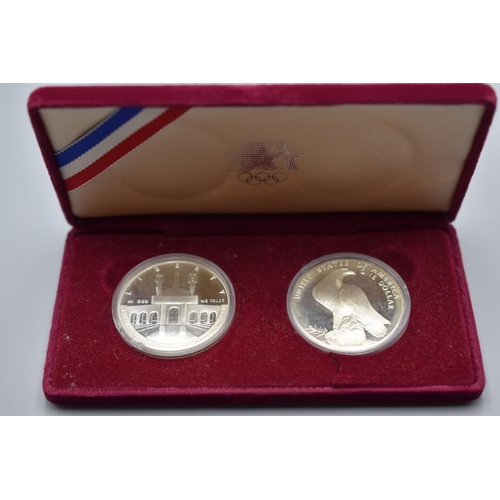 76 - Cased Set of Silver 1984 Olympic Dollars in Complete with Certificate of Authenticity