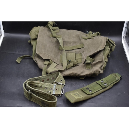 105 - Large Green Canvas British Army Knapsack, a Bayonet Scabbard and a Waist Belt