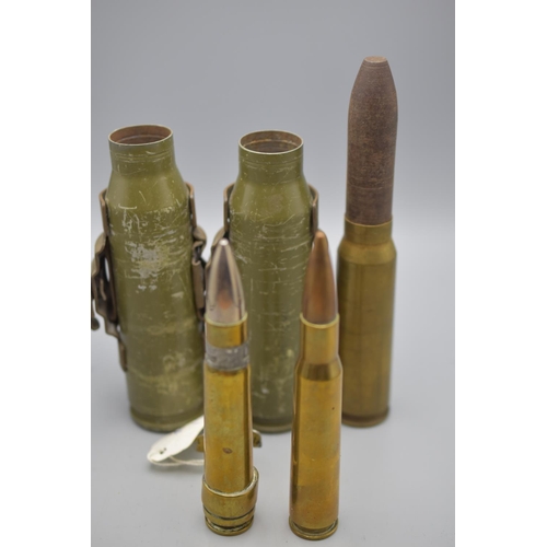 121 - Five Inert Cannon Shells