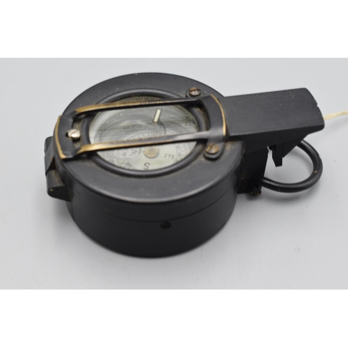 60 - Black cased military prismatic marching compass. Made by Enbeeco