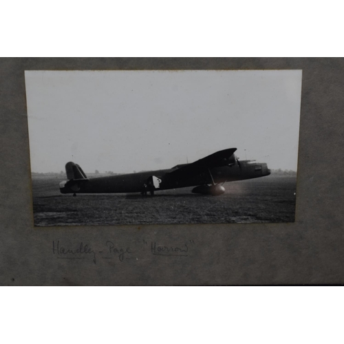 66 - Two RAF WWII Framed photographs. One of five airmen and one of a handley Page Harrow bomber aircraft