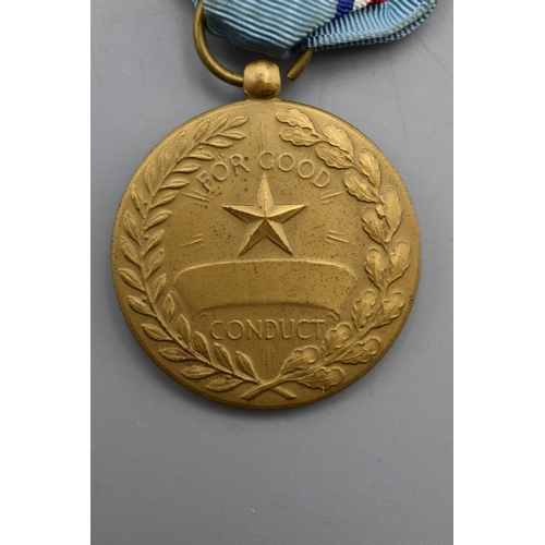 86 - Full sized US airforce good conduct medal with ribbon and pin bar