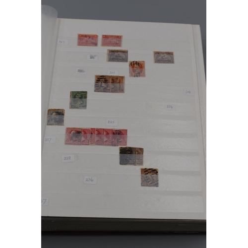 39 - Album Containing a Large Selection of US Postal Service Stamps dating From 1898