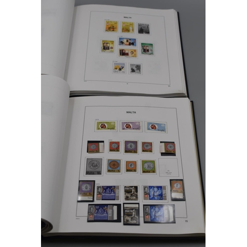 67 - Two Cased Albums of Maltese Stamps Dating From 1885 in Two Volumes including Queen Victoria, Edward ... 