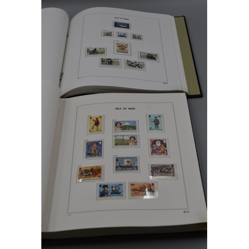 68 - Two Isle of Man Cased Stanley Gibbons Albums of Mint Stamps dating From 1973 in two Volumes