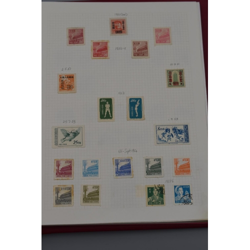 71 - Album of Chinese, Japanese, North Korean, and South Korean Post Marked Stamps dating From 1892