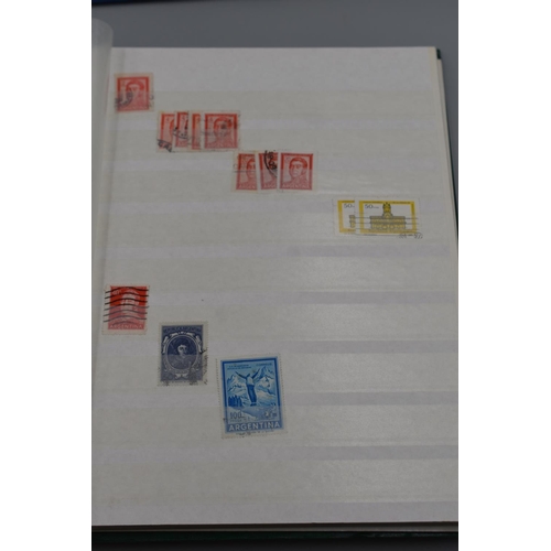 83 - Three Albums Containing a Mixed selection of Stamp's including Argentina, German Democratic Republic... 