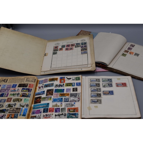 88 - Four Stamp Books including The Victory and Satellite Albums, with s Selection of Stamps including Vi... 