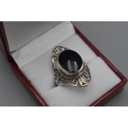 10 - Silver 925 Size UK S, Large Ring with intricate design and what appears to be an Onyx Gemstone.