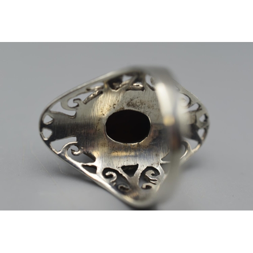 10 - Silver 925 Size UK S, Large Ring with intricate design and what appears to be an Onyx Gemstone.