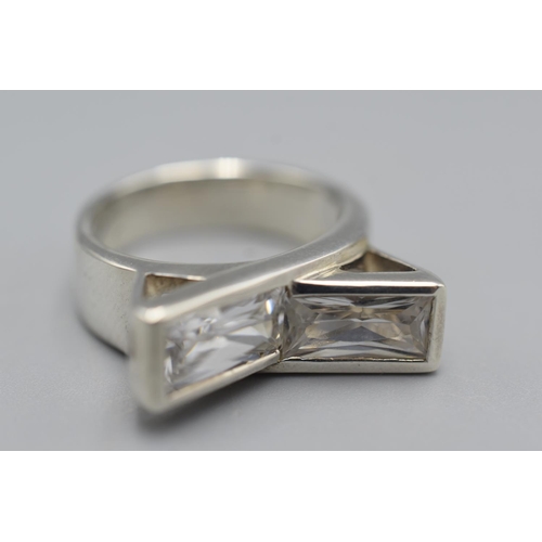 79 - Silver 925 Ring with Raised stones set in a bow design complete with Presentation Box Size Q