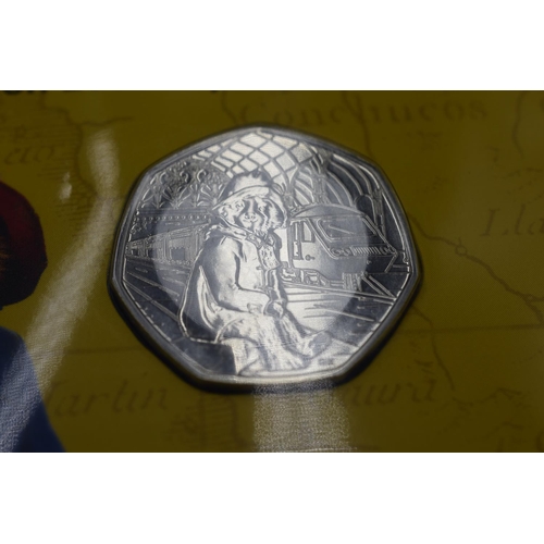 60 - Selection of 4 Brilliant Uncirculated 50p Coin Sets including Paddington, The Snowman, Florence Nigh... 