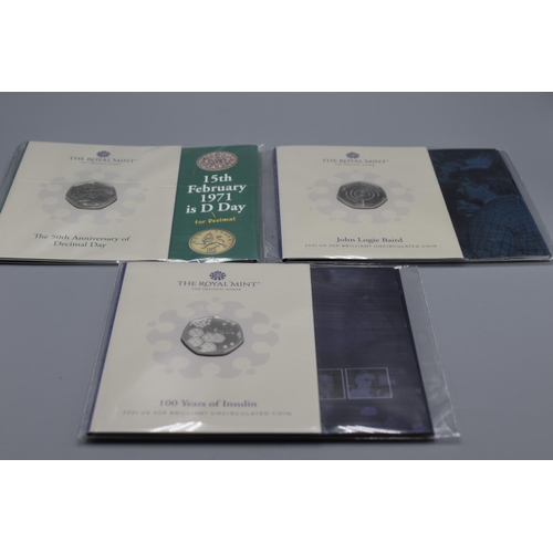 62 - Three Royal Mint Brilliant Uncirculated Collectors Coins including Decimal Day, 100 Years of Insulin... 