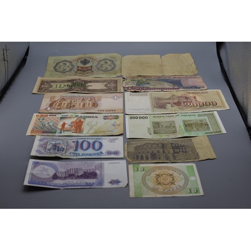 94 - Selection of 12 Mixed Worldwide Banknotes