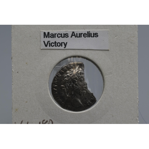 66 - Marcus Aurelius AR Denarius - Victory placing shield inscribed VIC/PAR.