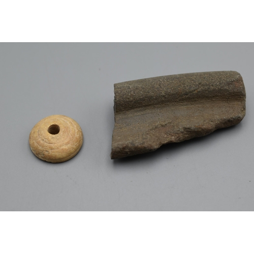 72 - A Roman Spindle Whorl and a Fragment of Pottery