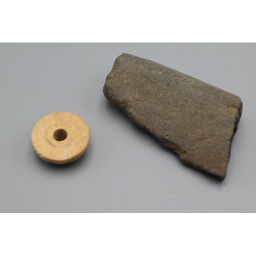 72 - A Roman Spindle Whorl and a Fragment of Pottery