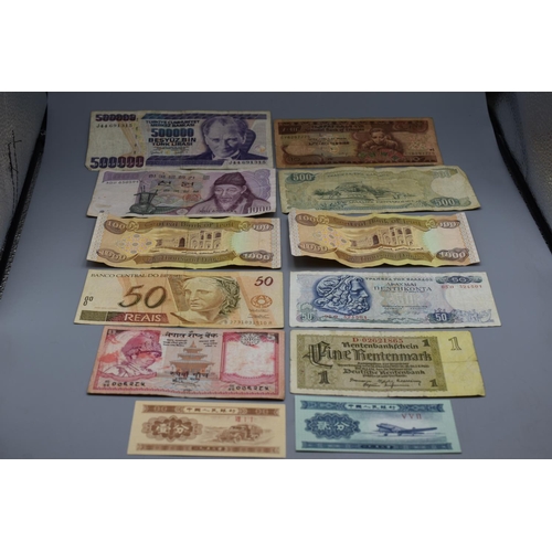 92 - Selection of 12 Mixed Worldwide Bank Notes