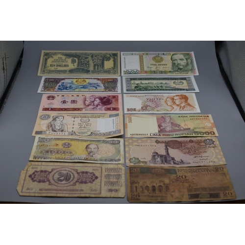 99 - Selection of 12 Mixed Worldwide Bank Notes