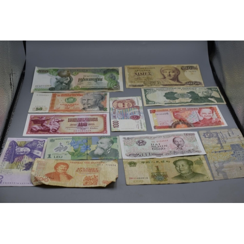 100 - Selection of 12 Mixed Worldwide Bank Notes