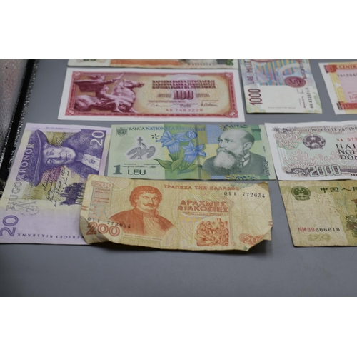 100 - Selection of 12 Mixed Worldwide Bank Notes