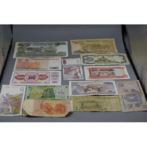 100 - Selection of 12 Mixed Worldwide Bank Notes