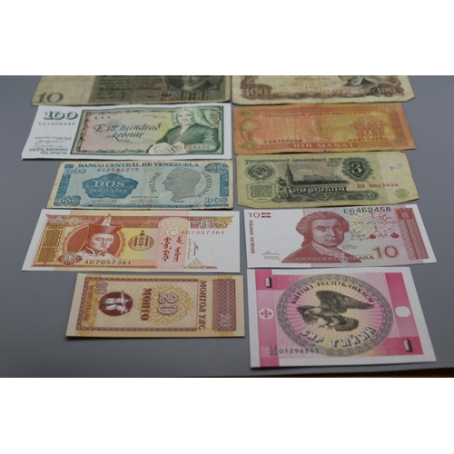 103 - Selection of 12 Mixed Worldwide Bank Notes