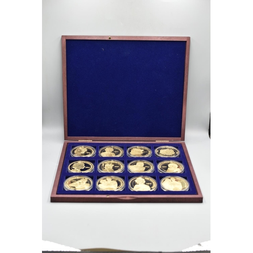 95 - Wooden Coin Display Box Containing a Selection of Commemorative Coins. Includes Jubilee Celebrations... 