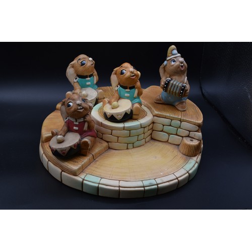 83 - Pendelfin Circular Band Stand With FigurinesIncluding 3 Variants Of Bongo And Squeezy Approx 10” In ... 