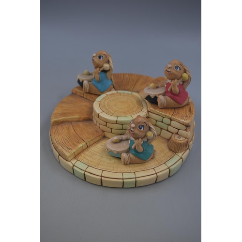 98 - Pendelfin Circular Band Stand with Three Bongo Figures (916722). Approx Diameter 10”.