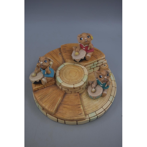 98 - Pendelfin Circular Band Stand with Three Bongo Figures (916722). Approx Diameter 10”.