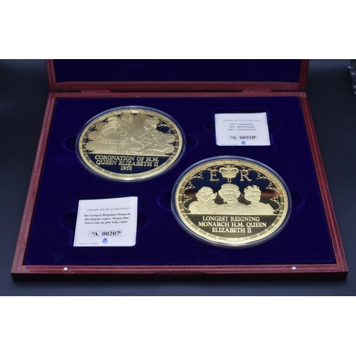 52 - Elizabeth II 100mm Gold Plated proof Coin set complete with Certificates and presentation case