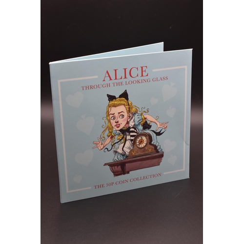 6 - Alice Through the Looking Glass brilliant uncirculated 50p Coin set in Case