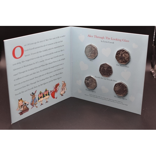 6 - Alice Through the Looking Glass brilliant uncirculated 50p Coin set in Case