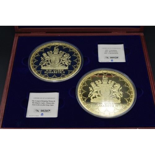 52 - Elizabeth II 100mm Gold Plated proof Coin set complete with Certificates and presentation case